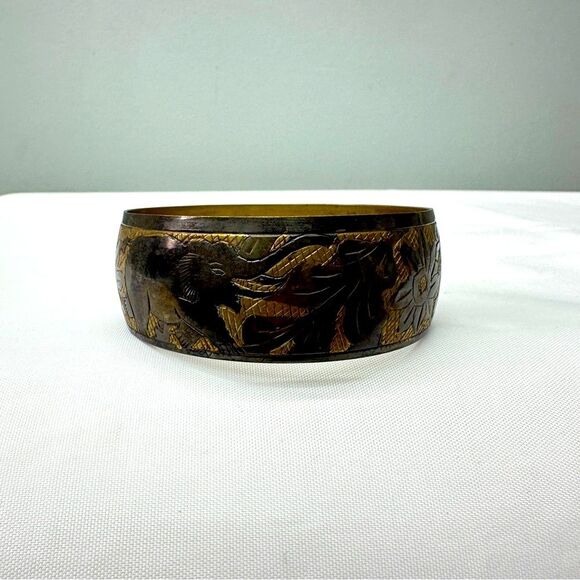 elephant bangle. pattern repeated 3 times around band. 2.75 inch diameter - Picture 3 of 3